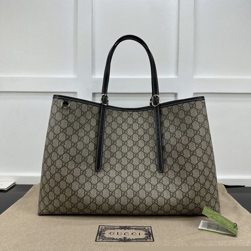 G*u*i shopping bags